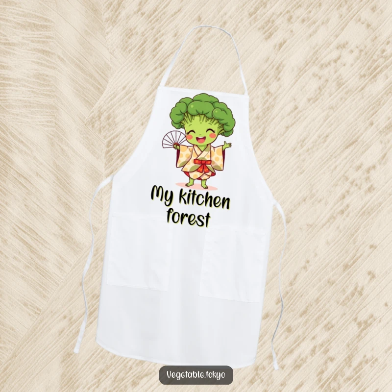 Funny apron featuring a joyful broccoli in a patterned kimono, performing a fan dance, perfect for artistic and humorous cooking.